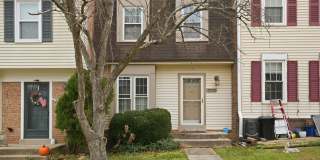 Welcome home to this charming three-level townhouse in the heart of Springfield! Gallery 1