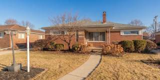 Generous Living on a Quiet Street, 4BR Brick Home with 2-Car Garage Gallery 1