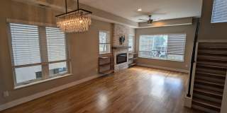 STUNNING 4-LEVEL TOWNHOME IN HIGHLANDS W/ 2-CAR GARAGE +AMAZING ROOFTOP DECK WITH VIEWS! Gallery 4