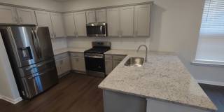 Beautiful Townhouse located in the McEwen Village! Gallery 3