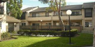 Charming Gated 2 bedroom and 1.5 Bath Condo with a Two-Car Garage Gallery 1