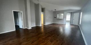 RESERVE AT WEDGEFIELD 3 bedroom 2 bath home with stainless appliances, laminate flooring and a fenced back  yard! Gallery 15