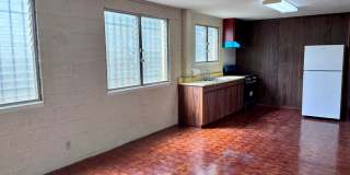 Available September 9, 2026 | A 3 Bedroom + Den, 1.5 bath duplex with 2 parking nested in Kaimuki Gallery 1