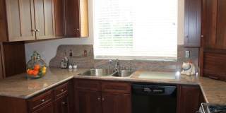 This incredible 4 bedroom single level home with private GATE  entry Gallery 6