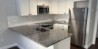 Fully Renovated Townhouse Style Condo For Rent in Newport! Gallery 1