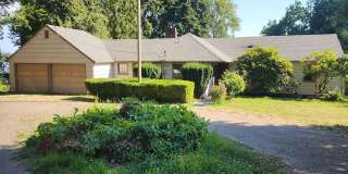 Waterfront Home on 1.5 Acres + 2 Car Garage + Fenced Yard (Vancouver – Evergreen Hwy) Gallery 1