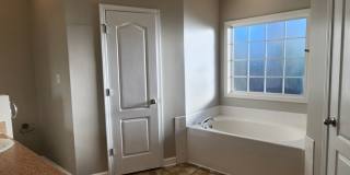 Spacious 4BR Home with Fireplace, Screened Porch & Privacy-Fenced Yard Gallery 10