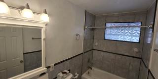 Beautiful 3 bed/ 1 bath home on large lot with walled and fenced front and back yard! Gallery 15