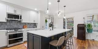 Beautifully Updated 5BR Home with Designer Kitchen, Main-Level Suite & Private Backyard Oasis Near Progress Ridge Gallery 13