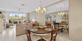 first-floor unit featuring a 2 bedroom, 2 bath fully furnished Gallery 7