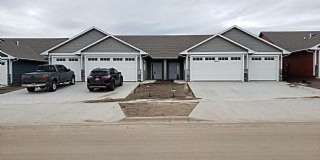 Three bedroom two bathroom Twin home w/ triple garage Gallery 1