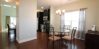 Gorgeous END UNIT 3 bedroom town home in desirable Harpers Mill with Garage and Primary on main with walk-in shower!! Gallery 9