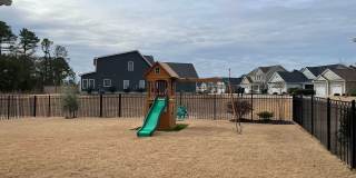 Beautiful 3 bedroom/2 bath home with sunroom and finished room over garage! Gallery 26