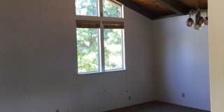 Downtown home with loft and exposed beam ceilings. Gallery 3