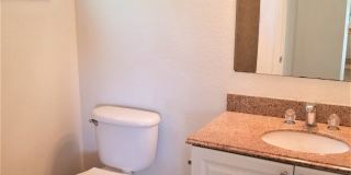 Beautifully maintained 2-bedroom, 2.5-bath townhome with a private fenced backyard and patio Gallery 14