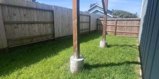 2 Bedroom 1 bath house with extra large double car garage and extra storage space! Gallery 21
