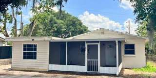 Great Location for This 4BR/1BA Lakeland Home! Large Screened In Porch, Fenced Backyard Gallery 1