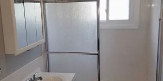 Cozy 3 bedroom 1.5 Bathroom Townhouse! Hardwood Throughout! Parking Included In Rent! Available for a June Move In! Gallery 20