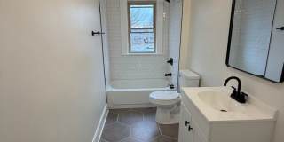 Rare 2-Full Bath Find: Pristine Renovation with Designer En-Suite & Granite Gallery 14