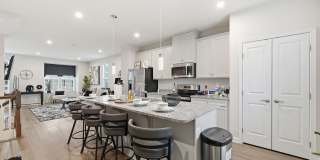 Welcome to this like new fully furnished home located in The Village at Courthouse Commons in Spotsylvania. Gallery 10