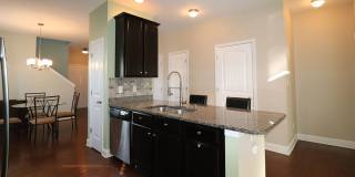 Gorgeous END UNIT 3 bedroom town home in desirable Harpers Mill with Garage and Primary on main with walk-in shower!! Gallery 8