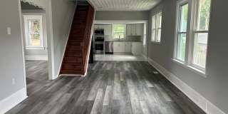 Beautifully Renovated 2-Bedroom House Featuring Extra Attic Storage Gallery 1