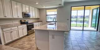 Annual Unfurnished Rental – Coach Home 3 Bedrooms, 2 Baths, 2 Car Garage, with Resort Like Amenities – Gran Paradiso Community! Gallery 3