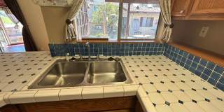 Cozy 2-Bedroom Duplex with Fireplace & Sunroom in Vista – Don’t Miss Out! Gallery 10