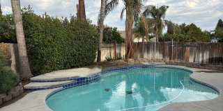 Beautiful 3-Bedroom Home with Bonus Room, Pool  RV Parking in The Seasons Gallery 1