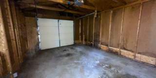 Fall into this cozy 3-Bedroom Home with a fenced in yard & detached garage! Gallery 24