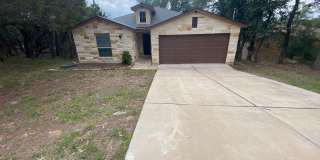 Beautiful home in Lago Vista with modern finishes and an open-concept layout! Gallery 1