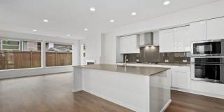 Spacious 4 bed 2.5 bath home w/ oversize 2 car garage & upgrades throughout! Gallery 3