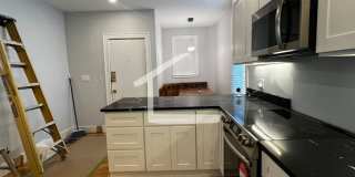 Duplex Near BU!  Brand New Luxury Renovation!   Samsung TV Included!   Breakfast Bar!  High End Appliances Gallery 6