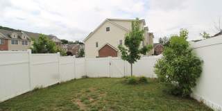 Spacious 3 Bedroom, 3.5 Bathroom Townhome with Finished Basement, Fenced Yard & Garage Gallery 33