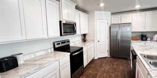 Picturesque Waterfront 4-Bedroom Home with Premium Amenities + 3 Car Garage! Community Amenities! Gallery 8