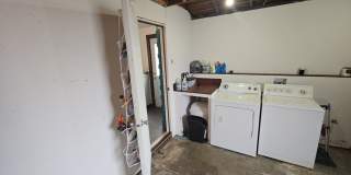 Beautifully designed 2BD/1BA home located near Henderson Center! Gallery 19