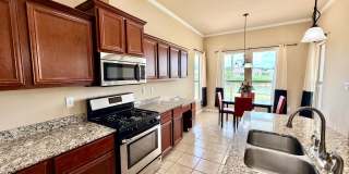 Beautiful 4BR Home with Scenic Lake View Backyard Gallery 1
