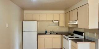 2bdrm, 1 bath lower level apartment close to parking and shopping with flexible month to month lease Gallery 1