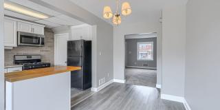 3 Bed 1 Bath Rowhome with OFFSTREET PARKING AND OUTSIDE STORAGE Gallery 1