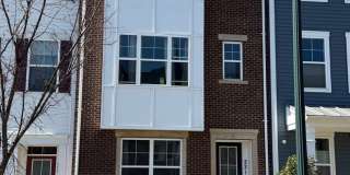 Spacious 4BR Townhome with 2-Car Garage  Balcony | Prime Clarksburg Location Near I-270 Gallery 1