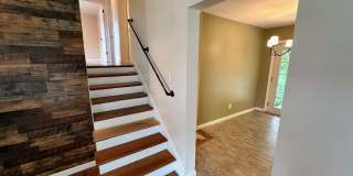 AVAILABLE NOW! Spacious 4 BR, 2 Bath House! Wood Floors, Attached Garage, W/D Included Gallery 5