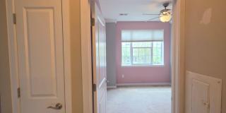 Beautiful 2nd floor (with elevator services) condominium: 2-bed, 2-bath, beautiful kitchen, bonus room, laundry room & deck! Gallery 24