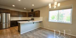 Modern End-Unit Townhome with Private Fenced Yard, Gourmet Kitchen & Spacious Layout Gallery 12