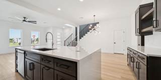 Welcome to this stunning new build in the desirable gated community of Broken Arrow, OK! Gallery 12