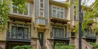 Stunning condo in Uptown's popular and pedestrian friendly First Ward with a roof top patio! Gallery 1