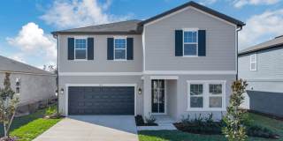 Like-New Ashton Woods Spacious 5BR 4BA, Prime Location Near I-4! Gallery 1