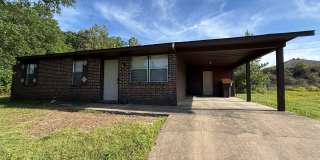 3 Bed 1.5 Bath House on Hill with Car Port.  Total Electric.  Yard Care Included. Gallery 1