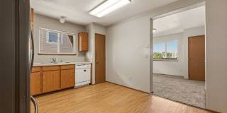 MOVE IN READY NOW! Desirable down town location. 2 bed, 1 bath. Includes water, sewer and garbage. Gallery 11