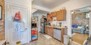 Charming 5-Bedroom Home with Exposed Brick and Modern Upgrades Gallery 11