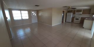 JUST REDUCED!!! 2/1.5/1 1000 Sq. Ft. NEW AC!!!Spacious living room, Lanai, fenced in yard, and tile floors thoughout! Gallery 3